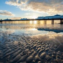 Low tide at Palace Pier in Brighton